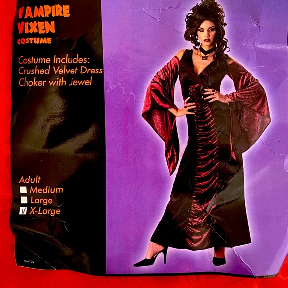 Vampire vixen costume in XL, comes with dress & choker. Clean and in package. - Picture 1 of 6